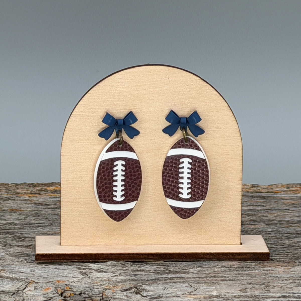Football with Blue Bow dangle earrings