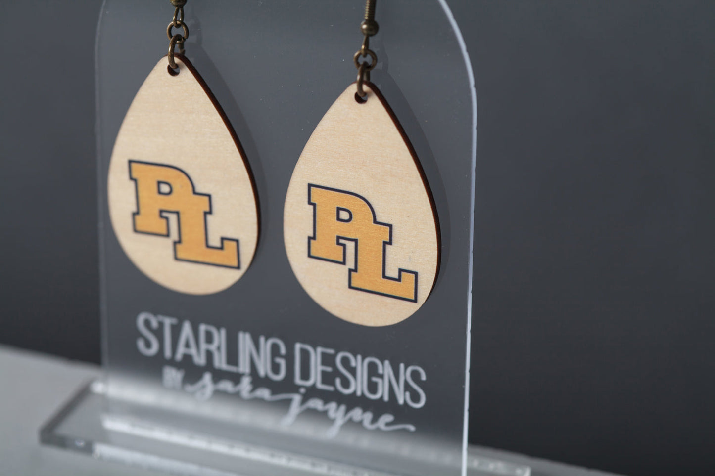 Prior Lake Yellow PL dangle earrings