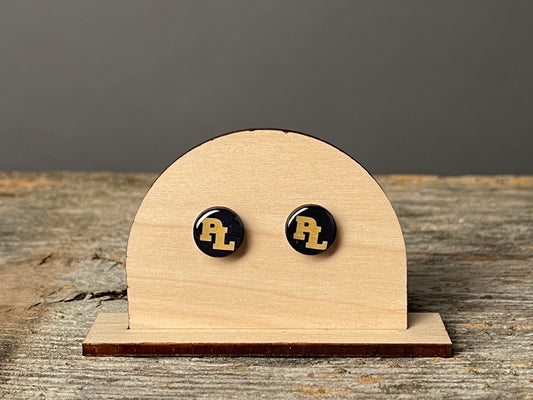 Prior Lake Yellow PL on Navy stud earrings