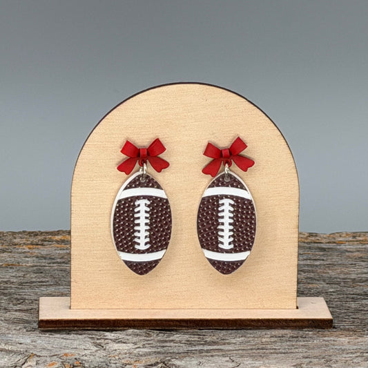 Football with Red Bow dangle earrings