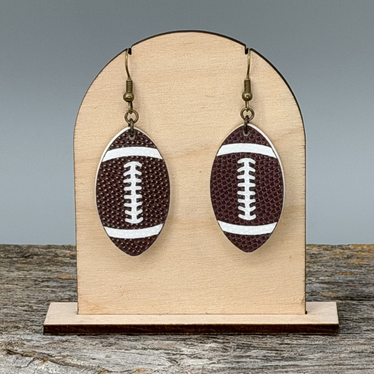 Football dangle earrings