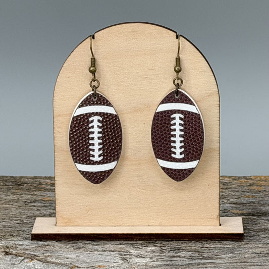 Football dangle earrings