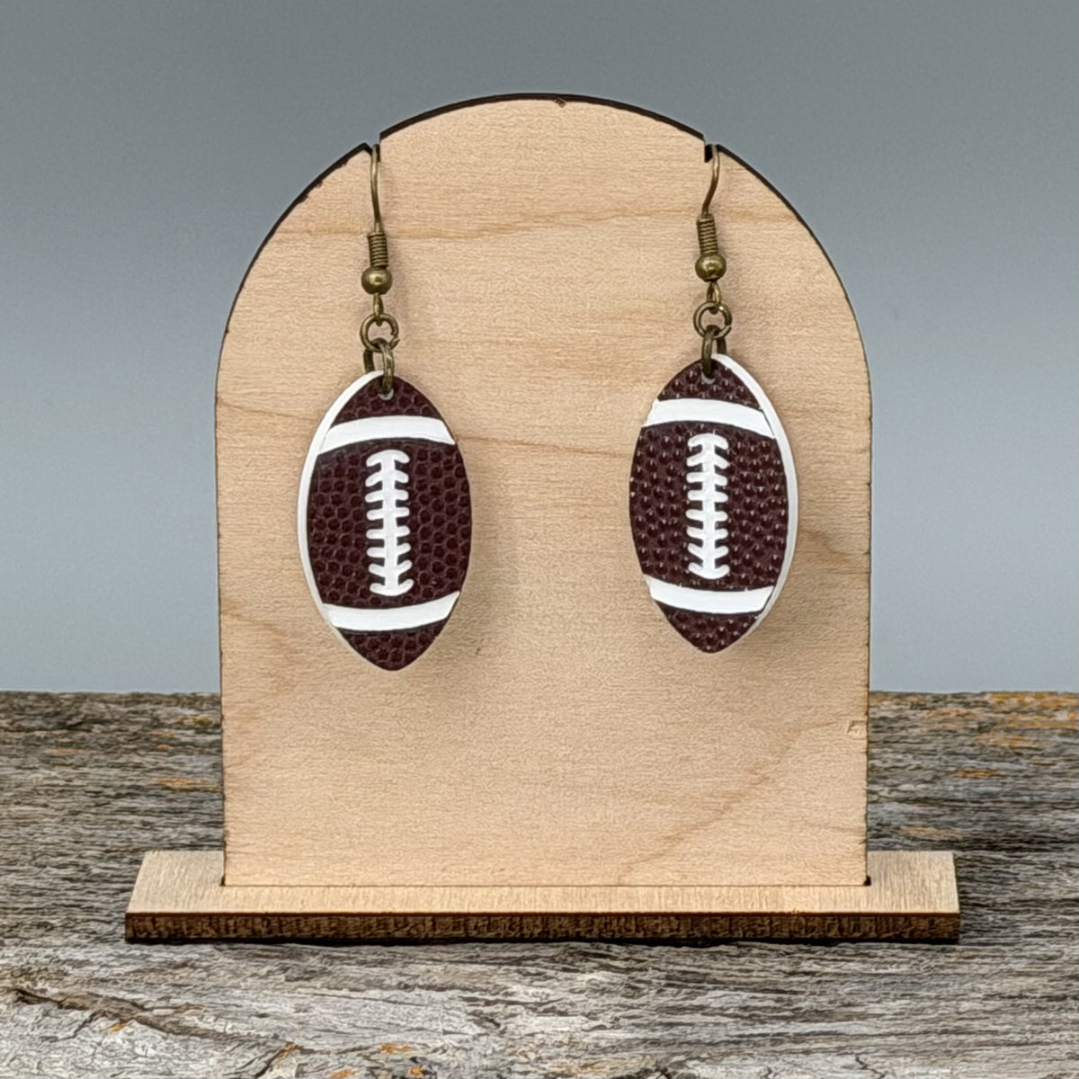 Football dangle earrings