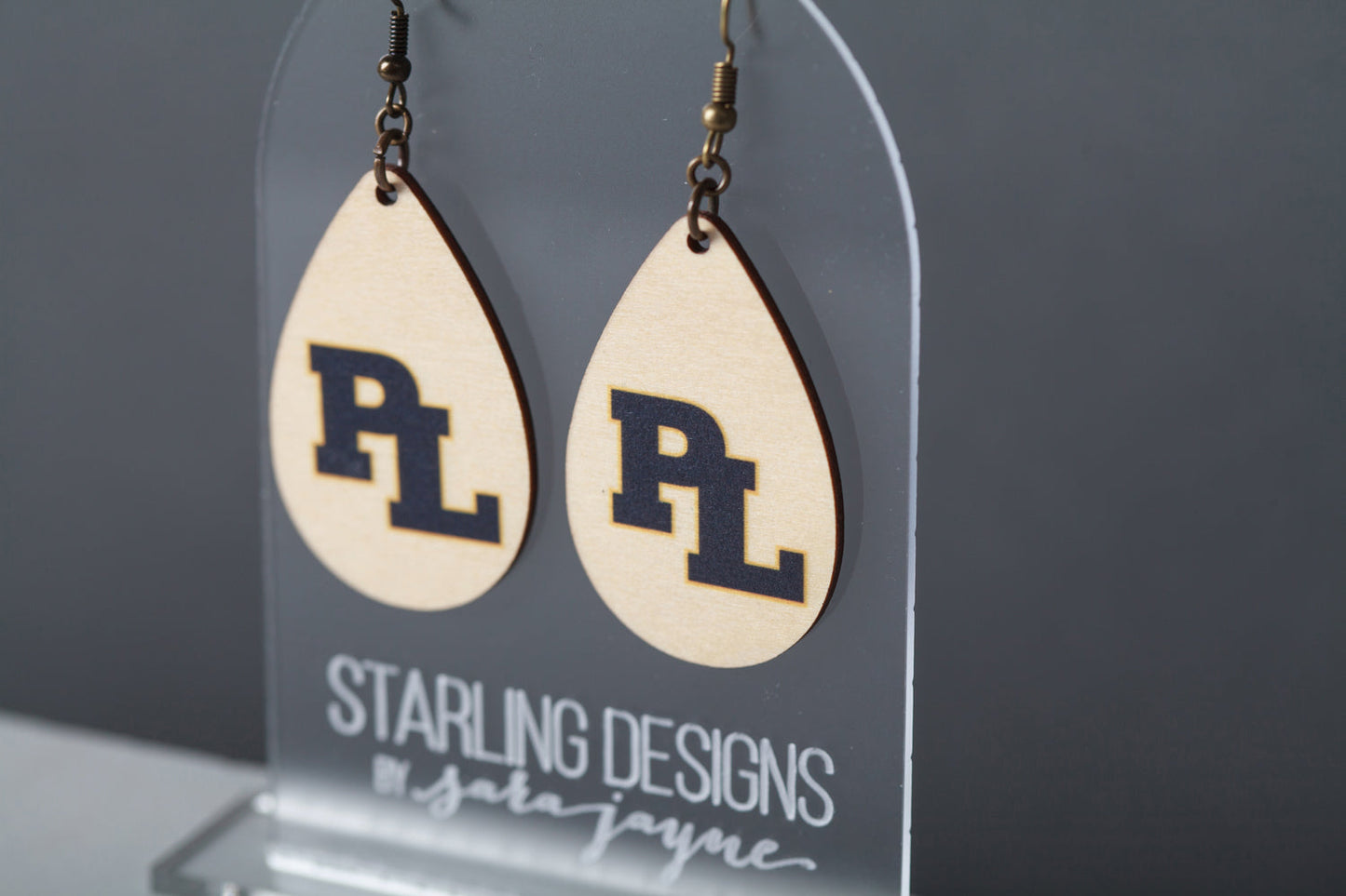 Prior Lake Navy PL dangle earrings